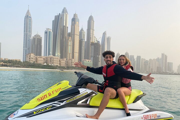 Experience the exhilaration of jet skiing against the stunning skyline of Dubai. Glide over the water and create unforgettable memories with friends while exploring iconic coastal views.